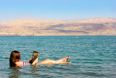 The large amount of salt in the Dead Sea allows any body to float on it.
