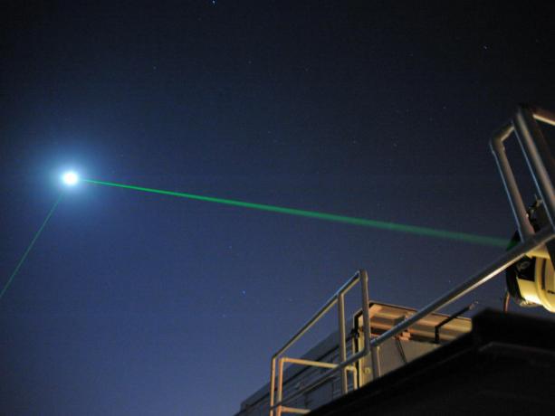 The laser in the photo is being emitted towards the LRO and then reflected. (Image credits: NASA)