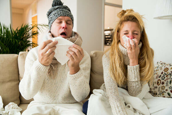 Flu is a virus-borne illness that can cause fever and body aches.