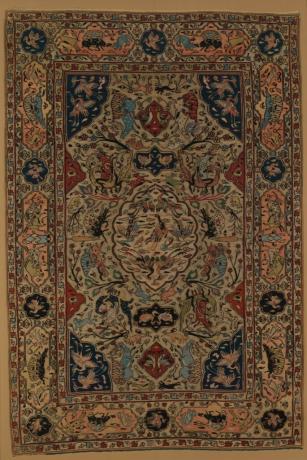 Persisk teppe med dysterdesign
