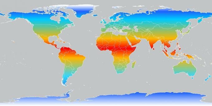 خريطة العالم بظلال اللون الأبيض والأزرق والبرتقالي والأحمر لتمثيل المناخ حول الكوكب.