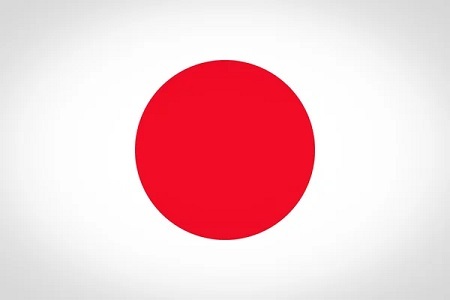 Japans flagga, i vitt och med en cirkel i mitten i rött. 