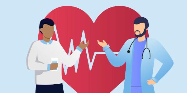 Кардиолог беседует с пациентом по случаю Всемирного дня сердца, отмечаемого 29 сентября.