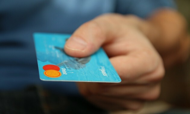 Debit card in hand